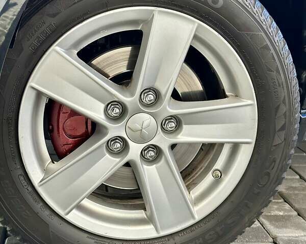 Черный Мицубиси Лансер, объемом двигателя 2 л и пробегом 150 тыс. км за 7850 $, фото 16 на Automoto.ua