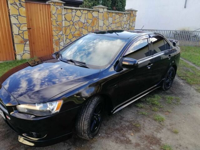 Міцубісі Lancer 2008 у Києві на Automoto.ua Чорний Міцубісі Lancer, об'ємом двигуна 2 л та пробігом 196 тис. км за 5500 $, фото 7 на Automoto.ua