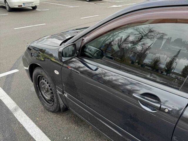 Чорний Міцубісі Lancer, об'ємом двигуна 1.6 л та пробігом 245 тис. км за 4500 $, фото 13 на Automoto.ua