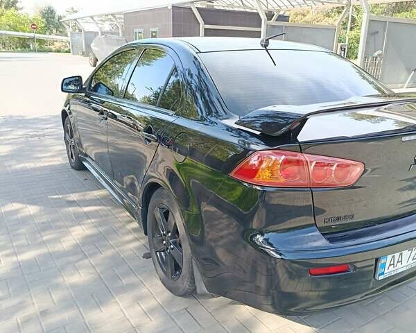 Мицубиси Лансер 2008 в Днепре (Днепропетровске) на Automoto.ua Черный Мицубиси Лансер, объемом двигателя 2 л и пробегом 196 тыс. км за 6900 $, фото 25 на Automoto.ua