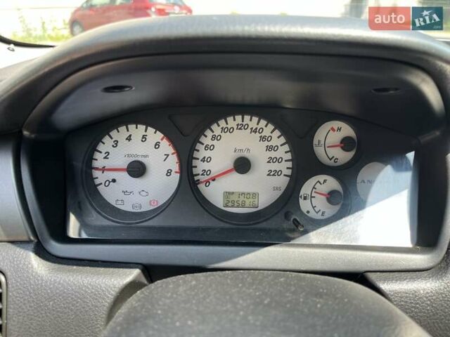 Чорний Міцубісі Lancer, об'ємом двигуна 1.6 л та пробігом 296 тис. км за 4200 $, фото 37 на Automoto.ua