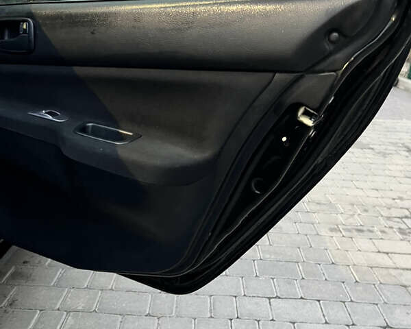 Чорний Міцубісі Lancer, об'ємом двигуна 1.6 л та пробігом 277 тис. км за 3900 $, фото 6 на Automoto.ua
