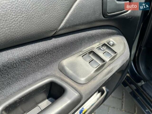 Чорний Міцубісі Lancer, об'ємом двигуна 1.6 л та пробігом 296 тис. км за 4200 $, фото 40 на Automoto.ua