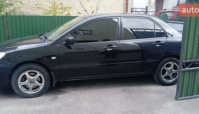 Мицубиси Лансер 2008 в Тернополе на Automoto.ua Черный Мицубиси Лансер, объемом двигателя 1.58 л и пробегом 110 тыс. км за 4900 $, фото 2 на Automoto.ua