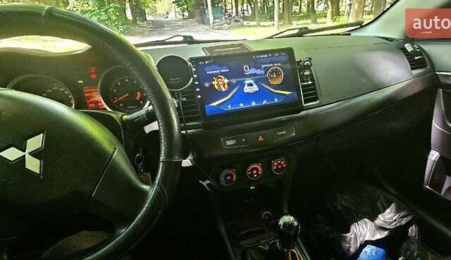 Черный Мицубиси Лансер, объемом двигателя 1.5 л и пробегом 205 тыс. км за 6300 $, фото 2 на Automoto.ua