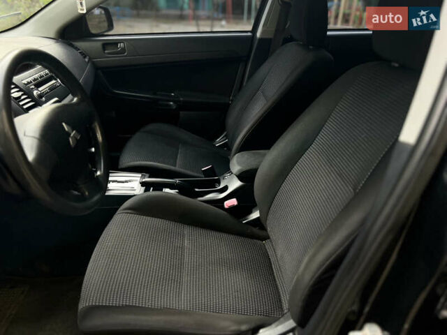 Чорний Міцубісі Lancer, об'ємом двигуна 1.5 л та пробігом 223 тис. км за 5899 $, фото 17 на Automoto.ua