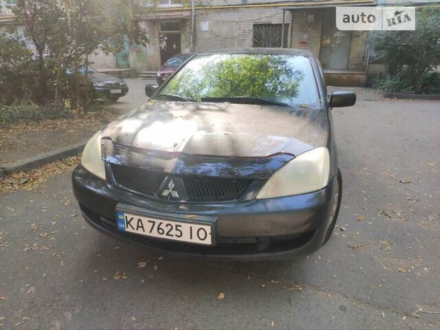Чорний Міцубісі Lancer, об'ємом двигуна 1.6 л та пробігом 335 тис. км за 3100 $, фото 1 на Automoto.ua
