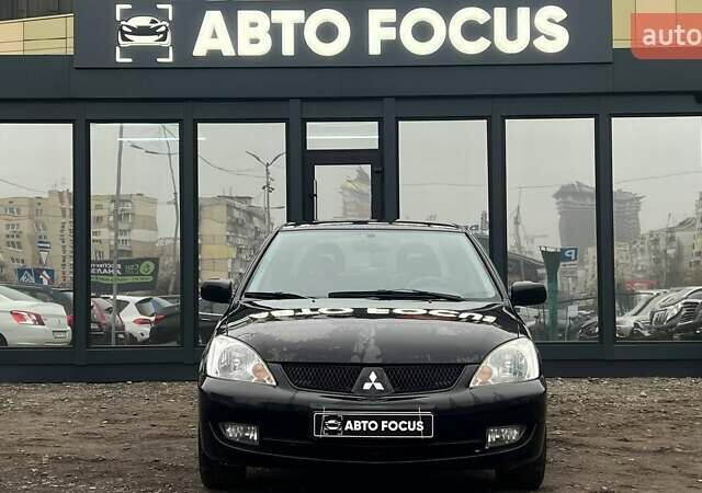 Чорний Міцубісі Lancer, об'ємом двигуна 1.6 л та пробігом 340 тис. км за 6190 $, фото 2 на Automoto.ua