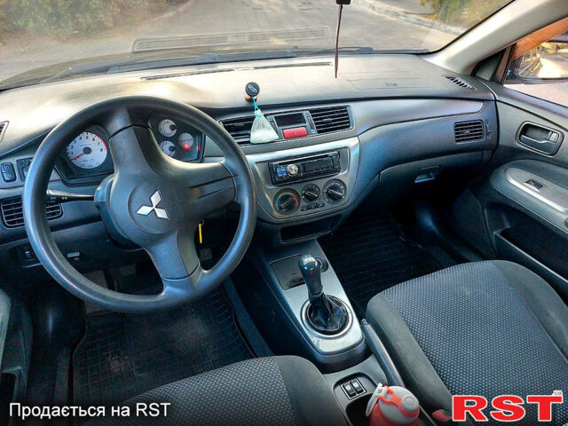 Черный Мицубиси Лансер, объемом двигателя 1.6 л и пробегом 216 тыс. км за 4500 $, фото 3 на Automoto.ua