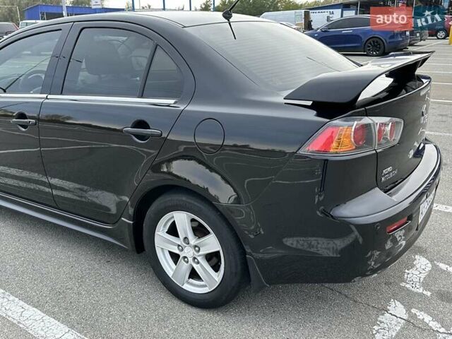 Чорний Міцубісі Lancer, об'ємом двигуна 2 л та пробігом 199 тис. км за 7900 $, фото 7 на Automoto.ua