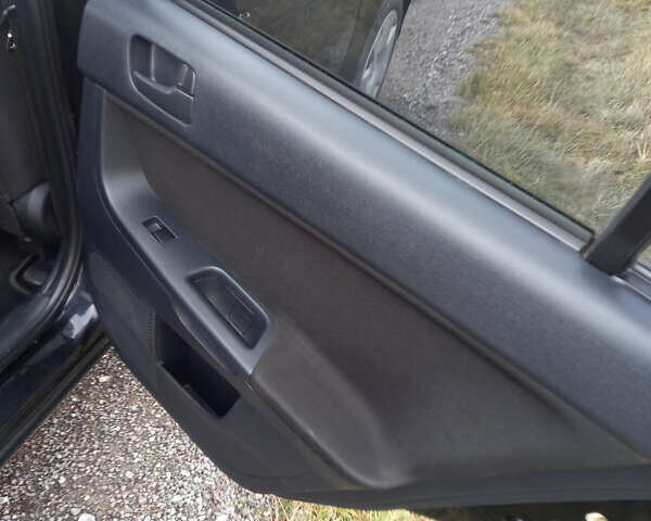 Чорний Міцубісі Lancer, об'ємом двигуна 1.5 л та пробігом 160 тис. км за 5850 $, фото 18 на Automoto.ua