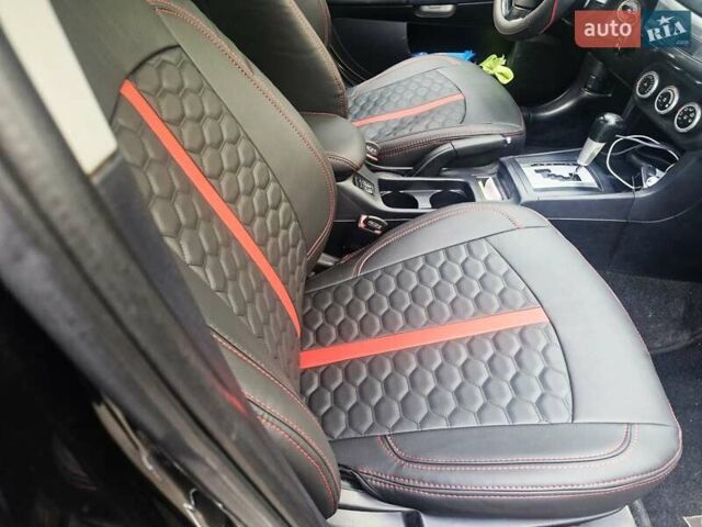 Чорний Міцубісі Lancer, об'ємом двигуна 2 л та пробігом 240 тис. км за 7850 $, фото 25 на Automoto.ua