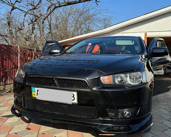 Чорний Міцубісі Lancer, об'ємом двигуна 2 л та пробігом 150 тис. км за 6500 $, фото 5 на Automoto.ua