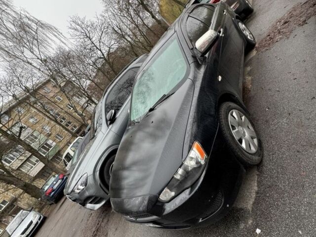 Чорний Міцубісі Lancer, об'ємом двигуна 1.5 л та пробігом 126 тис. км за 6499 $, фото 1 на Automoto.ua