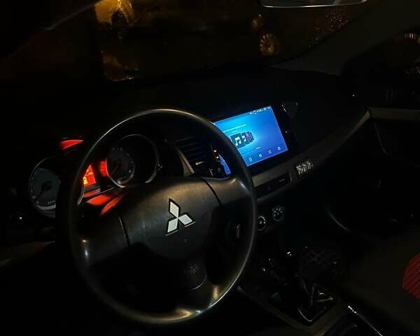 Черный Мицубиси Лансер, объемом двигателя 1.5 л и пробегом 167 тыс. км за 5500 $, фото 7 на Automoto.ua