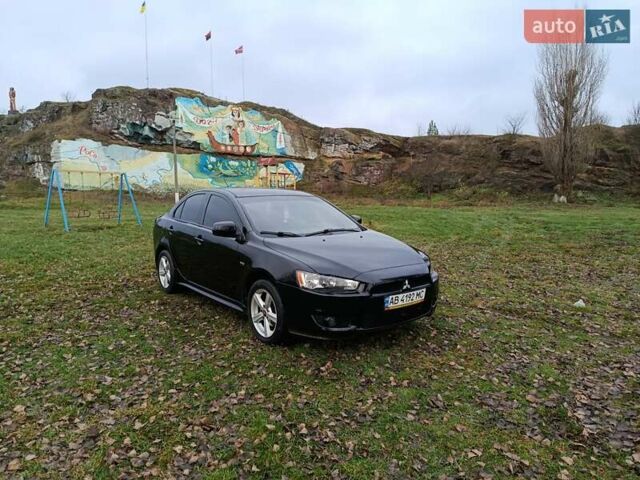 Черный Мицубиси Лансер, объемом двигателя 2 л и пробегом 200 тыс. км за 5100 $, фото 5 на Automoto.ua