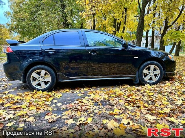 Чорний Міцубісі Lancer, об'ємом двигуна 2 л та пробігом 245 тис. км за 5500 $, фото 7 на Automoto.ua