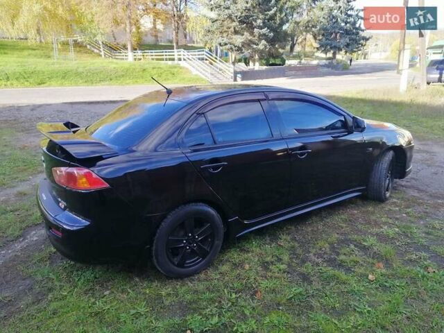 Мицубиси Лансер 2008 в Киеве на Automoto.ua Черный Мицубиси Лансер, объемом двигателя 2 л и пробегом 196 тыс. км за 5500 $, фото 3 на Automoto.ua