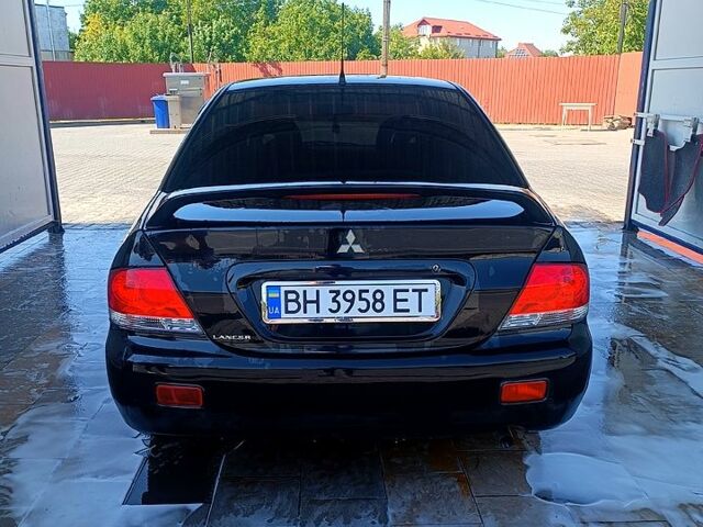 Чорний Міцубісі Lancer, об'ємом двигуна 1.6 л та пробігом 0 тис. км за 4200 $, фото 2 на Automoto.ua