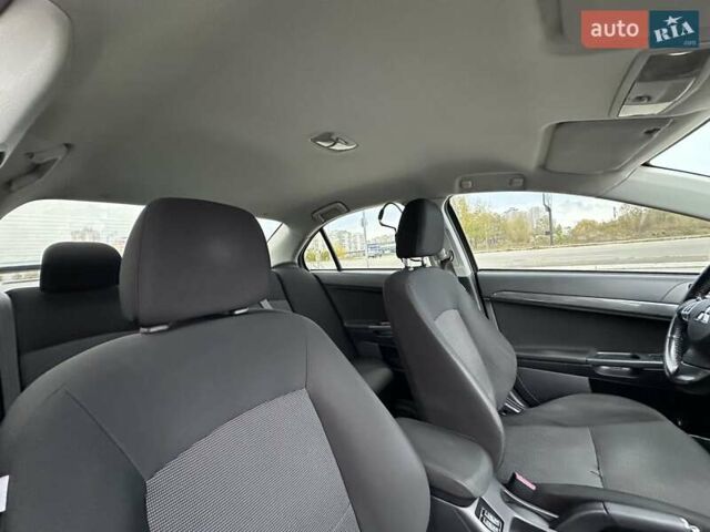 Чорний Міцубісі Lancer, об'ємом двигуна 2 л та пробігом 199 тис. км за 7900 $, фото 18 на Automoto.ua