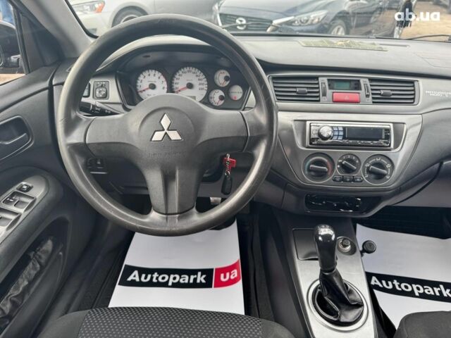Мицубиси Лансер 2008 в Запорожье на Automoto.ua Черный Мицубиси Лансер, объемом двигателя 1.6 л и пробегом 316 тыс. км за 4290 $, фото 9 на Automoto.ua
