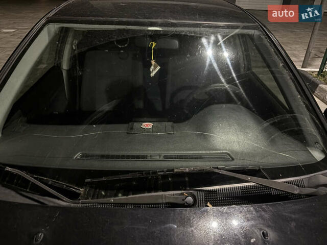 Черный Мицубиси Лансер, объемом двигателя 1.58 л и пробегом 230 тыс. км за 4300 $, фото 1 на Automoto.ua