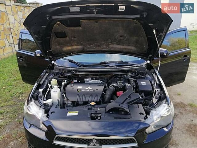 Мицубиси Лансер 2008 в Киеве на Automoto.ua Черный Мицубиси Лансер, объемом двигателя 2 л и пробегом 196 тыс. км за 5500 $, фото 31 на Automoto.ua