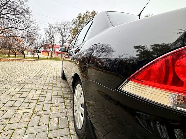 Черный Мицубиси Лансер, объемом двигателя 1.6 л и пробегом 185 тыс. км за 5500 $, фото 4 на Automoto.ua