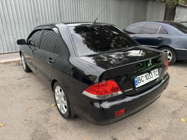 Мицубиси Лансер 2008 в Харькове на Automoto.ua Черный Мицубиси Лансер, объемом двигателя 1.6 л и пробегом 245 тыс. км за 4300 $, фото 3 на Automoto.ua