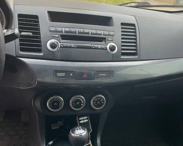 Чорний Міцубісі Lancer, об'ємом двигуна 2 л та пробігом 255 тис. км за 6999 $, фото 10 на Automoto.ua