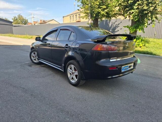 Чорний Міцубісі Lancer, об'ємом двигуна 2 л та пробігом 230 тис. км за 6650 $, фото 6 на Automoto.ua