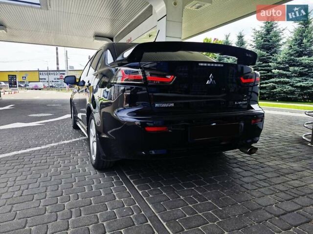 Чорний Міцубісі Lancer, об'ємом двигуна 2 л та пробігом 240 тис. км за 7850 $, фото 8 на Automoto.ua