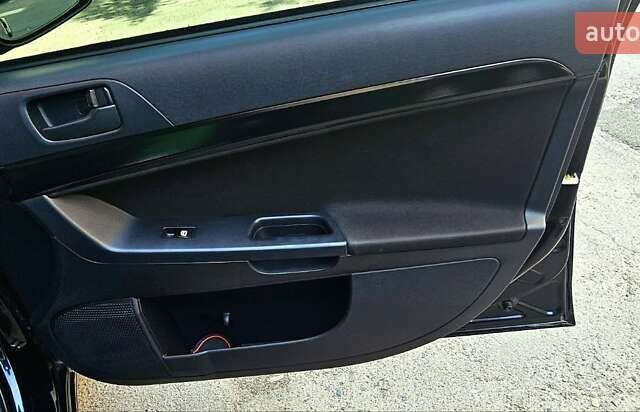 Черный Мицубиси Лансер, объемом двигателя 1.5 л и пробегом 205 тыс. км за 6300 $, фото 18 на Automoto.ua