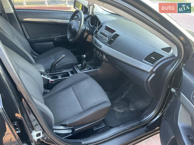 Черный Мицубиси Лансер, объемом двигателя 1.5 л и пробегом 263 тыс. км за 5300 $, фото 8 на Automoto.ua