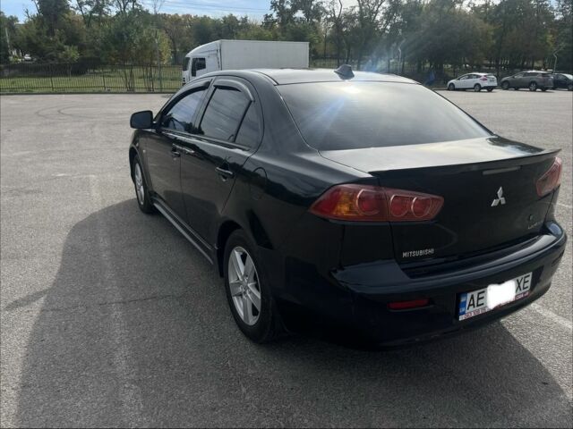 Чорний Міцубісі Lancer, об'ємом двигуна 2 л та пробігом 221 тис. км за 6300 $, фото 4 на Automoto.ua