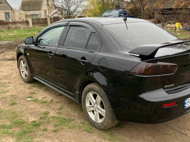Чорний Міцубісі Lancer, об'ємом двигуна 2 л та пробігом 180 тис. км за 7500 $, фото 3 на Automoto.ua