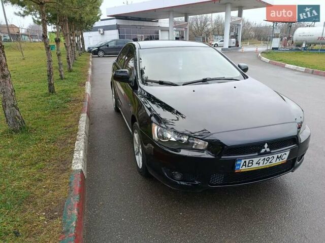Черный Мицубиси Лансер, объемом двигателя 2 л и пробегом 200 тыс. км за 5100 $, фото 18 на Automoto.ua