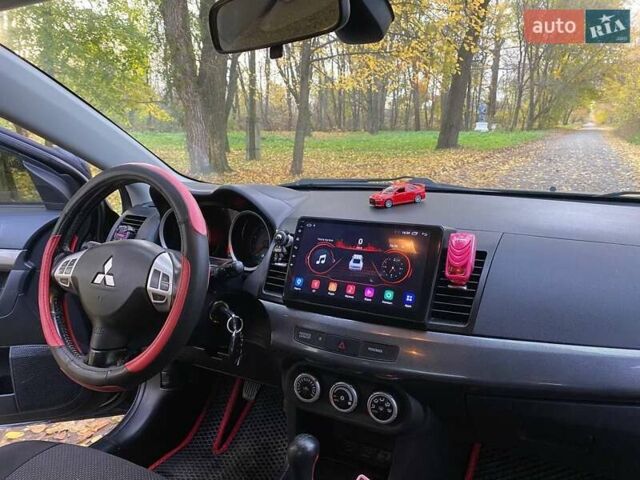 Чорний Міцубісі Lancer, об'ємом двигуна 2 л та пробігом 237 тис. км за 7500 $, фото 21 на Automoto.ua
