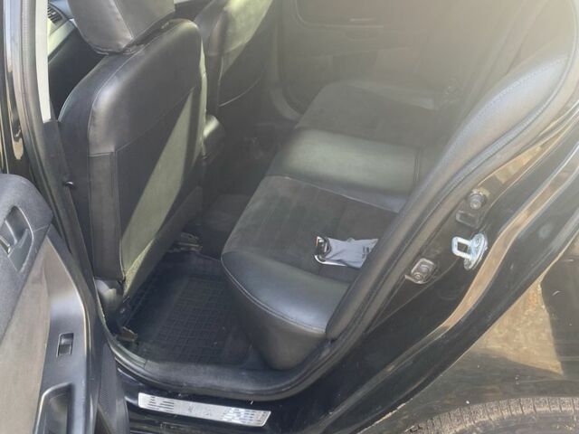 Черный Мицубиси Лансер, объемом двигателя 2 л и пробегом 190 тыс. км за 3100 $, фото 5 на Automoto.ua