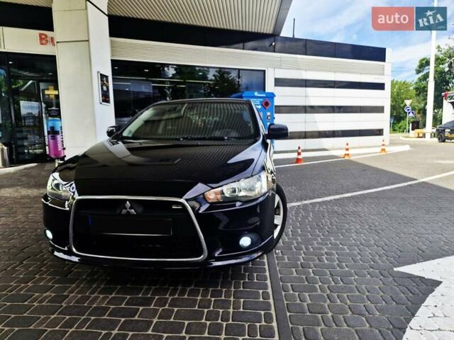 Чорний Міцубісі Lancer, об'ємом двигуна 2 л та пробігом 240 тис. км за 7850 $, фото 7 на Automoto.ua