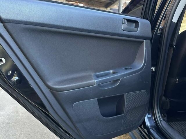 Чорний Міцубісі Lancer, об'ємом двигуна 2 л та пробігом 230 тис. км за 6650 $, фото 17 на Automoto.ua