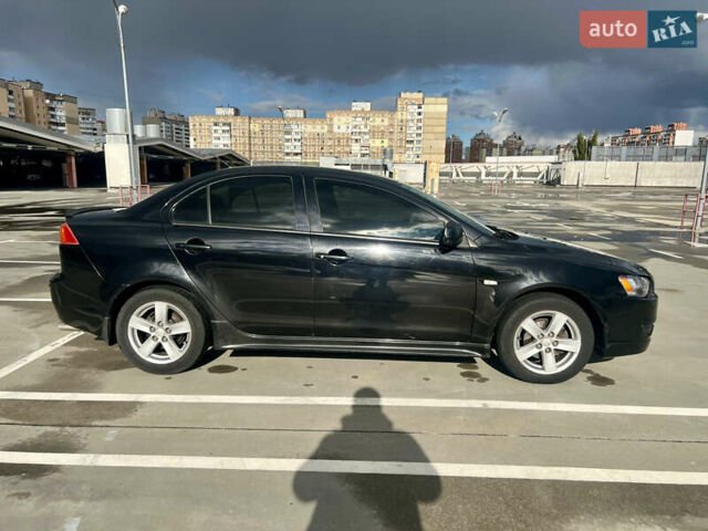 Мицубиси Лансер 2008 в Киеве на Automoto.ua Черный Мицубиси Лансер, объемом двигателя 2 л и пробегом 219 тыс. км за 6500 $, фото 7 на Automoto.ua