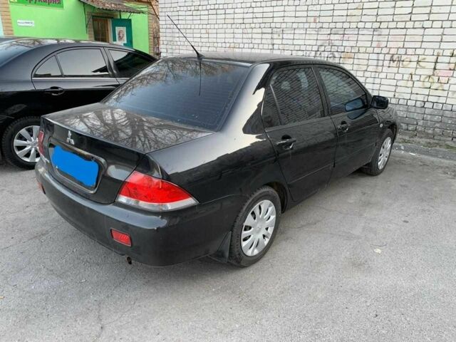 Чорний Міцубісі Lancer, об'ємом двигуна 0 л та пробігом 250 тис. км за 4900 $, фото 1 на Automoto.ua