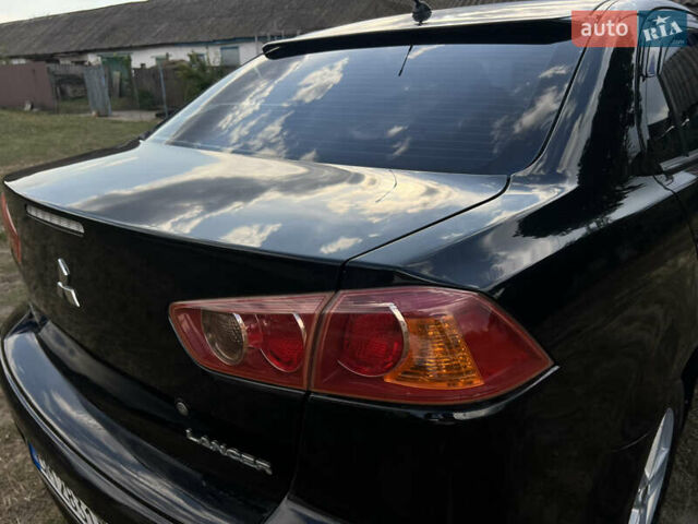 Чорний Міцубісі Lancer, об'ємом двигуна 1.5 л та пробігом 223 тис. км за 5699 $, фото 14 на Automoto.ua