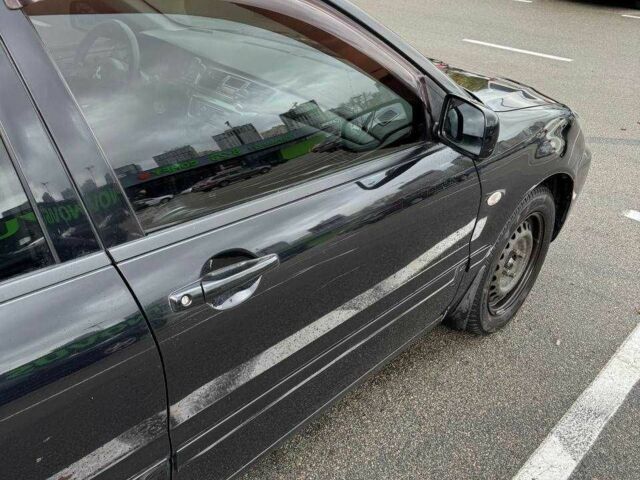 Чорний Міцубісі Lancer, об'ємом двигуна 1.6 л та пробігом 245 тис. км за 4500 $, фото 6 на Automoto.ua