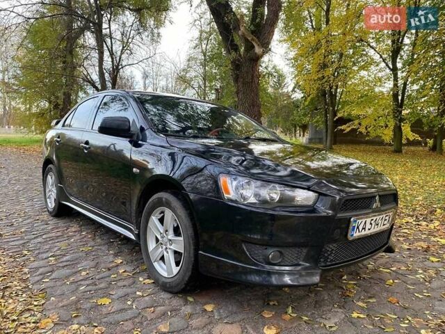 Чорний Міцубісі Lancer, об'ємом двигуна 2 л та пробігом 237 тис. км за 7500 $, фото 7 на Automoto.ua