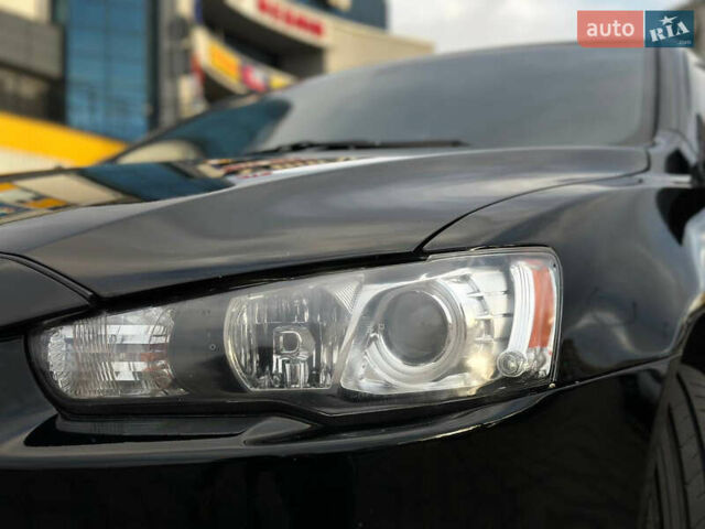 Черный Мицубиси Лансер, объемом двигателя 2 л и пробегом 236 тыс. км за 7950 $, фото 14 на Automoto.ua