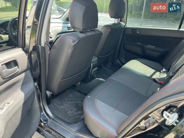 Чорний Міцубісі Lancer, об'ємом двигуна 1.6 л та пробігом 296 тис. км за 4200 $, фото 27 на Automoto.ua