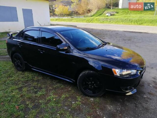 Мицубиси Лансер 2008 в Киеве на Automoto.ua Черный Мицубиси Лансер, объемом двигателя 2 л и пробегом 196 тыс. км за 5500 $, фото 4 на Automoto.ua