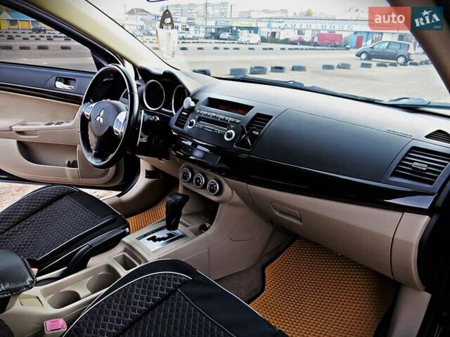 Мицубиси Лансер 2008 в Черкассах на Automoto.ua Черный Мицубиси Лансер, объемом двигателя 2 л и пробегом 178 тыс. км за 7400 $, фото 17 на Automoto.ua